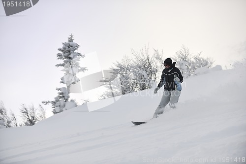 Image of freestyle snowboarder
