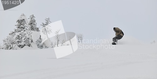 Image of freestyle snowboarder