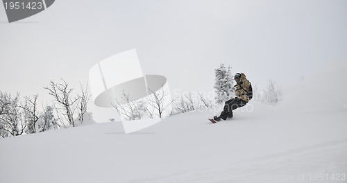 Image of freestyle snowboarder