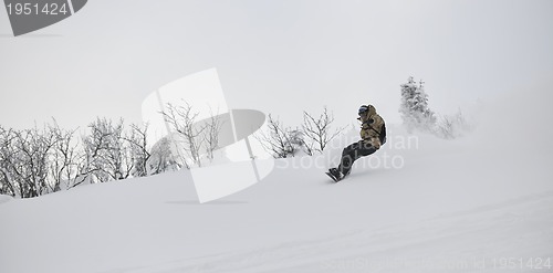 Image of freestyle snowboarder