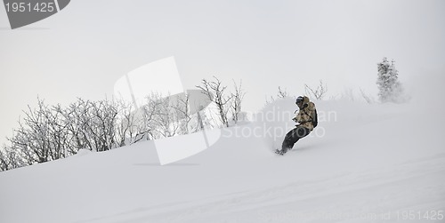 Image of freestyle snowboarder