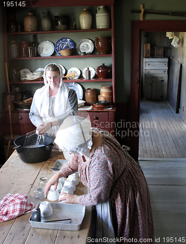 Image of Women working in English traditional dress