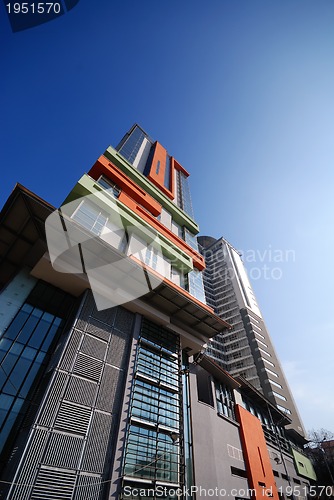 Image of modern building at sunny day and clear blue sky