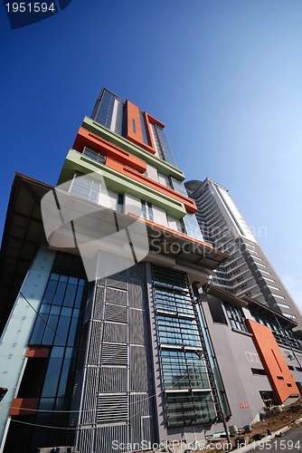 Image of modern building at sunny day and clear blue sky