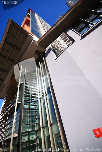 Image of modern building at sunny day and clear blue sky