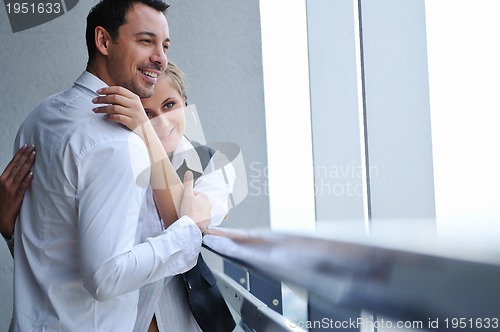 Image of romantic happpy couple on balcony 