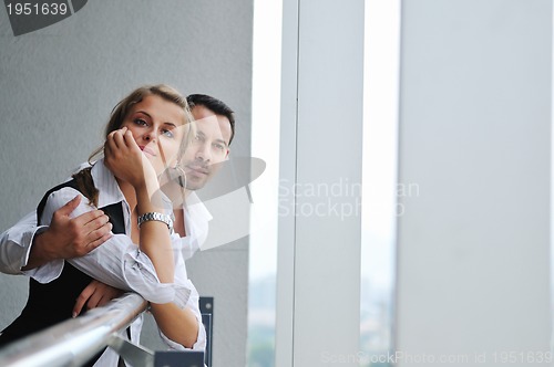 Image of romantic happpy couple on balcony 