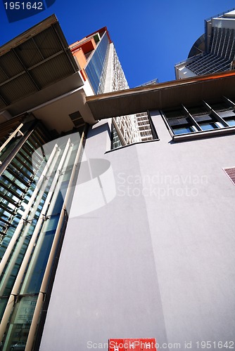 Image of modern building at sunny day and clear blue sky