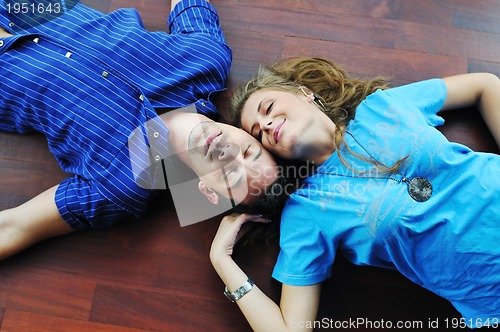Image of happy couple in empty apartment