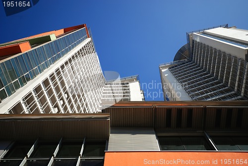 Image of modern building at sunny day and clear blue sky