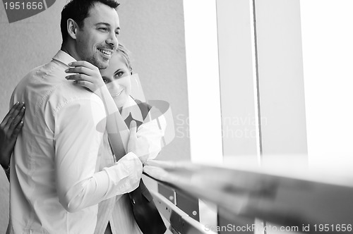 Image of romantic happpy couple on balcony