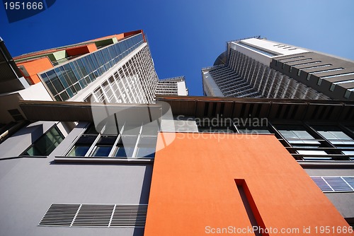 Image of modern building at sunny day and clear blue sky