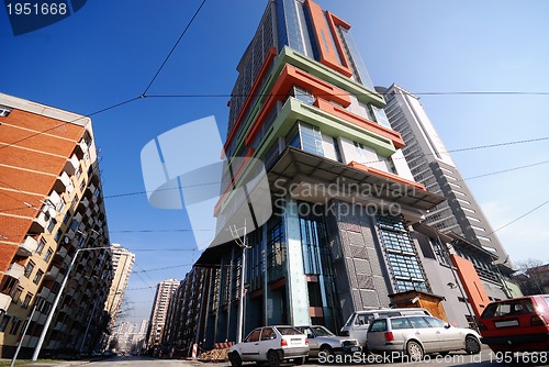 Image of modern building at sunny day and clear blue sky