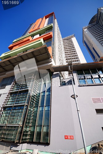 Image of modern building at sunny day and clear blue sky