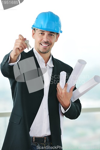 Image of isolated business man hold keys