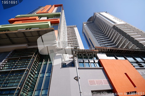 Image of modern building at sunny day and clear blue sky