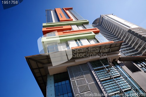 Image of modern building at sunny day and clear blue sky