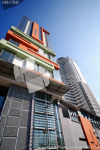 Image of modern building at sunny day and clear blue sky