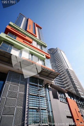 Image of modern building at sunny day and clear blue sky