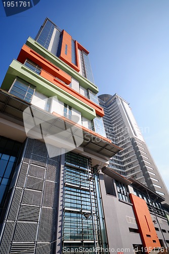 Image of modern building at sunny day and clear blue sky