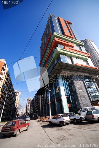 Image of modern building at sunny day and clear blue sky