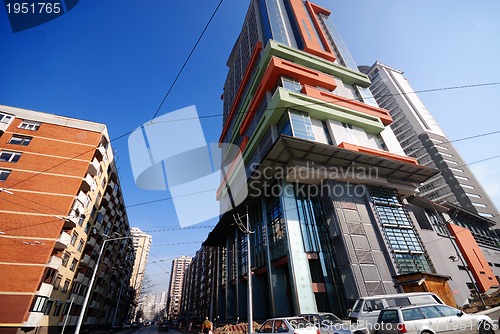 Image of modern building at sunny day and clear blue sky