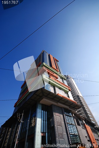 Image of modern building at sunny day and clear blue sky