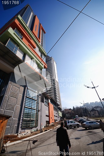 Image of modern building at sunny day and clear blue sky