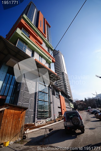 Image of modern building at sunny day and clear blue sky