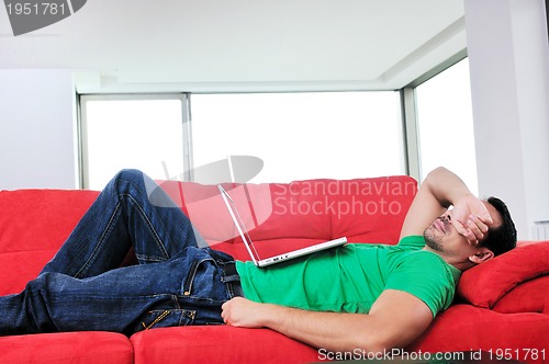 Image of happy couple in empty apartment