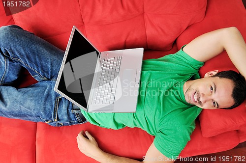 Image of happy couple in empty apartment