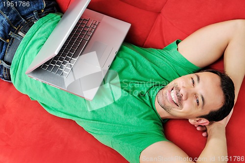 Image of happy couple in empty apartment