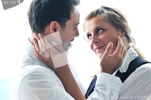 Image of romantic happpy couple on balcony