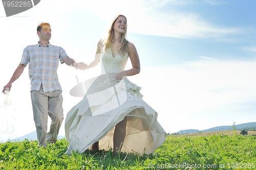 Image of happy bride and groon outdoor