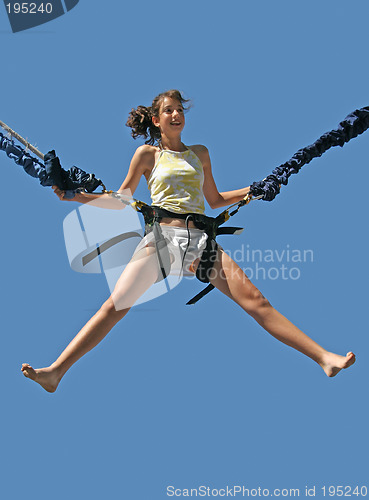 Image of Girl bungee jumping