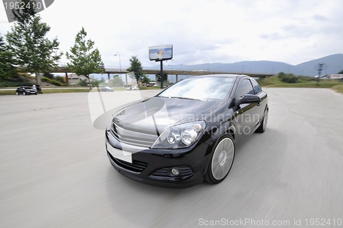 Image of Fast car moving with motion blur