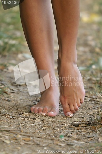Image of bare foot woman walk outdoor 