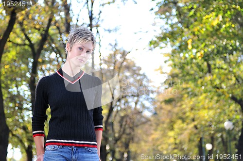 Image of blonde Cute young woman posing outdoors