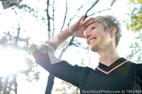 Image of blonde Cute young woman looking out 