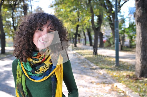 Image of brunette Cute young woman  smiling 