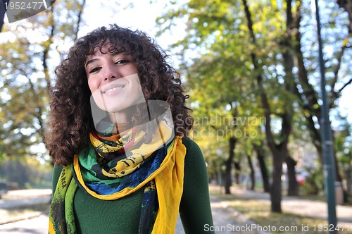 Image of brunette Cute young woman  smiling 