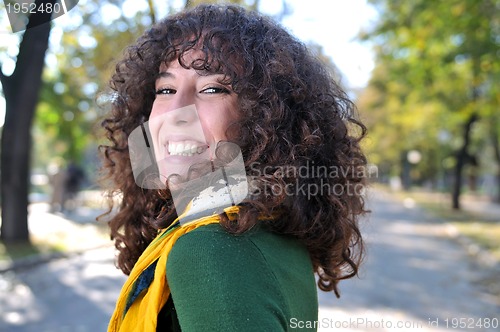 Image of brunette Cute young woman  smiling 