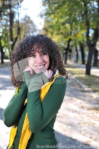 Image of brunette Cute young woman  smiling 