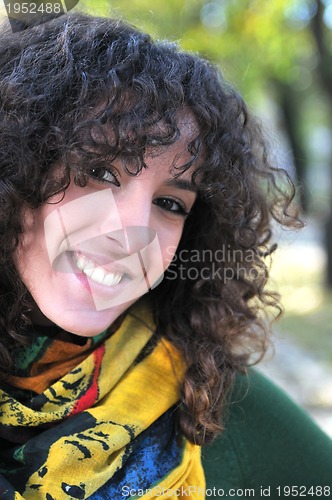 Image of brunette Cute young woman  smiling 