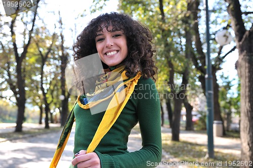 Image of brunette Cute young woman  smiling 