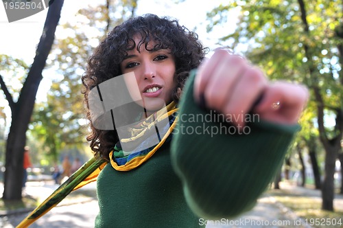 Image of brunette Cute young woman  posing outdoors