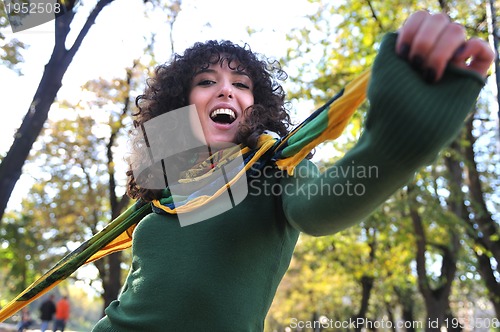 Image of brunette Cute young woman  smiling 