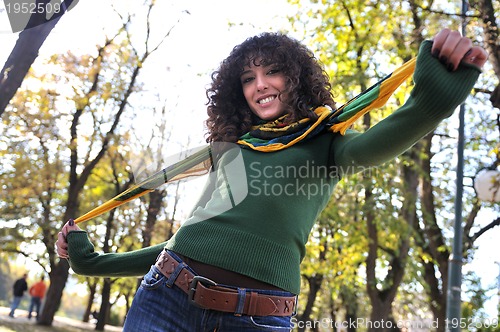 Image of brunette Cute young woman  smiling 