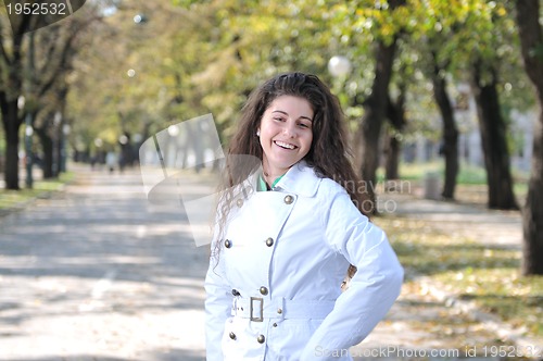 Image of Happy young woman smiling 