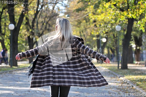 Image of Cute young woman smiling 